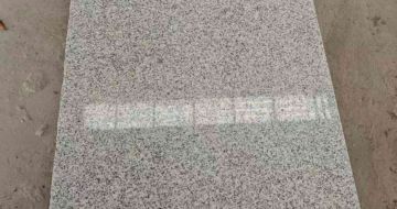 荆州芝麻白光面毛板